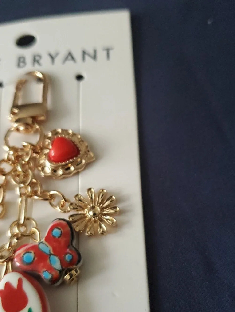 Lane Bryant Gold-Tone Charm Keychain with Red and Blue Accents